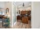 Well-appointed home office featuring built-in bookshelves, wooden desk, and ample storage space at 11168 Sweet Cicely Dr, Parker, CO 80134