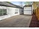 The backyard features stone pavers and a detached garage at 1755 Ingalls St, Lakewood, CO 80214