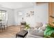 Inviting living space featuring a cozy seating area, modern decor, and lots of natural light at 1755 Ingalls St, Lakewood, CO 80214