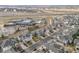 Aerial view of suburban neighborhood, revealing the home's location near a highway and local businesses at 12941 Grant W Cir # C, Thornton, CO 80241