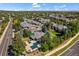 Aerial view of Copper Crest condos nestled among mature trees in a serene neighborhood at 710 Copper Ln # 102, Louisville, CO 80027