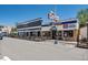 Street view of restaurants and bars with outdoor seating, showcasing vibrant local businesses in the community at 710 Copper Ln # 102, Louisville, CO 80027