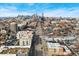 Aerial view of apartment building with views of downtown, perfect for urban living and city exploration at 277 N Broadway # 409, Denver, CO 80203