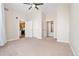 Bedroom with ceiling fan and multiple doorways to the bathroom and kitchen areas at 277 N Broadway # 409, Denver, CO 80203