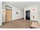 Hallway area with elevator access, unit access and seating with carpeted floors at 277 N Broadway # 409, Denver, CO 80203