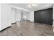 Spacious entry foyer featuring wood floors and a modern staircase with metal railing at 17161 E Dewberry Dr, Parker, CO 80134