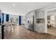 Spacious kitchen with dining area, featuring modern appliances, stylish cabinets, and bright natural light at 5202 Reed St, Arvada, CO 80002