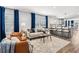 Spacious living room with an open layout, seamlessly blending with the modern kitchen at 5202 Reed St, Arvada, CO 80002