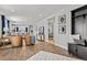 Open concept living room with sight lines to the kitchen at 5202 Reed St, Arvada, CO 80002