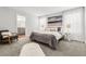 Bedroom boasts soft carpet and modern decor. Includes a spacious bathroom en suite at 5202 Reed St, Arvada, CO 80002