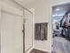 Bathroom featuring a glass enclosed shower and a doorway to the walk-in closet at 5995 Fencerow Pl, Brighton, CO 80601