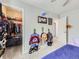 Cozy bedroom with organized closet space and playful decor, perfect for a or guest room at 5995 Fencerow Pl, Brighton, CO 80601