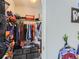 Closet with clothing, toy guns and toy foosball table, for an active kid at 5995 Fencerow Pl, Brighton, CO 80601