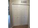 Hall closet with white bi-fold doors for storage at 17346 Nature Walk Trail Trl # 201, Parker, CO 80134