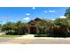 Community clubhouse exterior with lush landscaping, inviting community gatherings and events at 17346 Nature Walk Trail Trl # 201, Parker, CO 80134