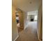 Open floor plan showcasing the living area and modern kitchen at 17346 Nature Walk Trail Trl # 201, Parker, CO 80134