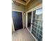 Cozy patio features a sliding glass door, leading to a welcoming outdoor space at 17346 Nature Walk Trail Trl # 201, Parker, CO 80134