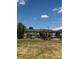 Community playground and green space with a picnic pavilion and multiple residential buildings at 17346 Nature Walk Trail Trl # 201, Parker, CO 80134