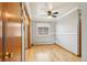 Sunny dining area boasts hardwood floors, neutral walls, and seamless access to the adjacent kitchen at 6086 W Arizona Ave, Lakewood, CO 80232