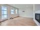 Bright and airy living room featuring hardwood floors and a fireplace at 21541 E 60 Th Ave, Aurora, CO 80019