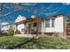 Cozy back patio with seating, offering a comfortable outdoor living space at 15930 E Ford Pl, Aurora, CO 80017
