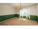 Dining room featuring a chandelier and large window at 15930 E Ford Pl, Aurora, CO 80017