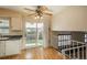 Open kitchen featuring a sliding glass door and a view of the backyard at 15930 E Ford Pl, Aurora, CO 80017