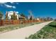 Peaceful walking path with wooden fence, offering a tranquil environment at 15930 E Ford Pl, Aurora, CO 80017