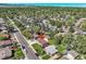 Aerial view of house and surrounding neighborhood, showcasing the property's location and setting at 6087 W 61St Pl, Arvada, CO 80003