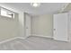 Finished basement bedroom with grey carpet and an additional door at 6087 W 61St Pl, Arvada, CO 80003