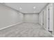 Spacious finished basement with grey carpet at 6087 W 61St Pl, Arvada, CO 80003