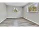 Bedroom with grey vinyl flooring and window at 6087 W 61St Pl, Arvada, CO 80003