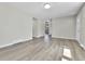 Spacious living room with vinyl plank flooring and lots of natural light at 6087 W 61St Pl, Arvada, CO 80003