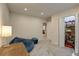 Finished basement area with closet, and access to the upper floor at 20194 Robins Dr, Denver, CO 80249