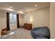 Cozy finished basement space featuring a window and a comfy beanbag chair at 20194 Robins Dr, Denver, CO 80249