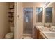 Bathroom features a shower and double sink vanity, perfect for busy mornings at 20194 Robins Dr, Denver, CO 80249