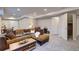 Finished basement with living room area and stairs to upper level at 20194 Robins Dr, Denver, CO 80249