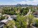 City skyline with diverse architecture and tree-lined streets creating a welcoming residential neighborhood at 3914 Osage St, Denver, CO 80211