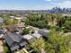 City skyline with diverse architecture and tree-lined streets creating a welcoming residential neighborhood at 3914 Osage St, Denver, CO 80211