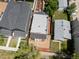An aerial view of a modern home showcasing its backyard and surrounding neighborhood at 3914 Osage St, Denver, CO 80211
