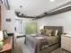 Inviting bedroom showcasing a well-lit space, comfortable bed, and convenient closet at 3914 Osage St, Denver, CO 80211