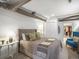 Inviting bedroom showcasing a well-lit space, comfortable bed, and a walk-in closet at 3914 Osage St, Denver, CO 80211