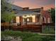 Charming brick home with a cozy front porch and a well-maintained fence at 3914 Osage St, Denver, CO 80211