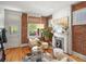 Inviting living room with exposed brick, a decorative fireplace, and hardwood floors at 3914 Osage St, Denver, CO 80211