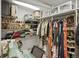 Functional walk-in closet features ample shelving, hanging racks, and a vanity area at 3914 Osage St, Denver, CO 80211