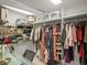 Well-organized closet with plenty of shelves, hanging space and a desk for accessories at 3914 Osage St, Denver, CO 80211