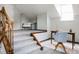 Bonus room with carpeted floors, desk space, and a cozy sitting area with natural light at 12631 W Dakota Dr, Lakewood, CO 80228