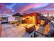 Enjoy rooftop living with a fire pit, seating, a grill, and stunning city views at 2350 Tremont Pl # 13, Denver, CO 80205