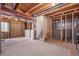 Unfinished basement with exposed beams and utilities provides a blank canvas for customization at 13846 Harrison Dr, Thornton, CO 80602