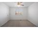 Standard bedroom featuring a ceiling fan and a window that provides lots of natural light at 13846 Harrison Dr, Thornton, CO 80602